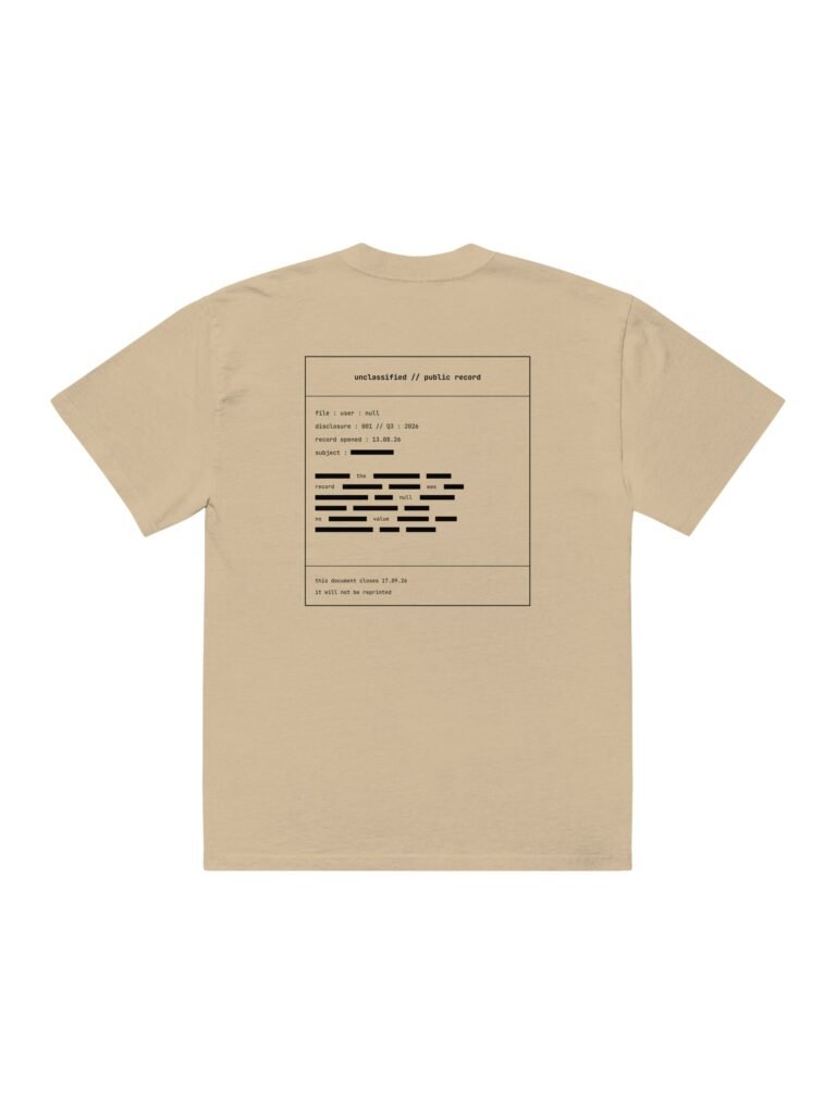 Flat back view of the manila user : null artefact tee showing the full redacted file cover document
